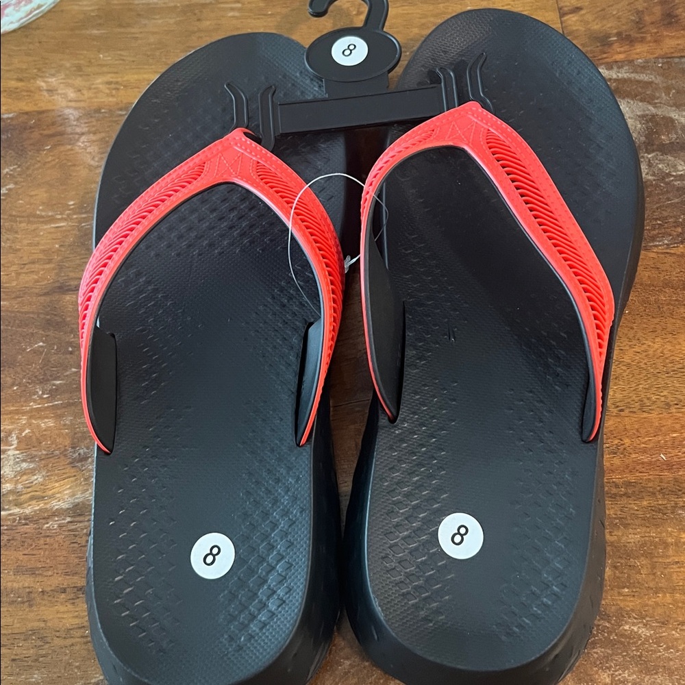Black and Orange Flip Flops